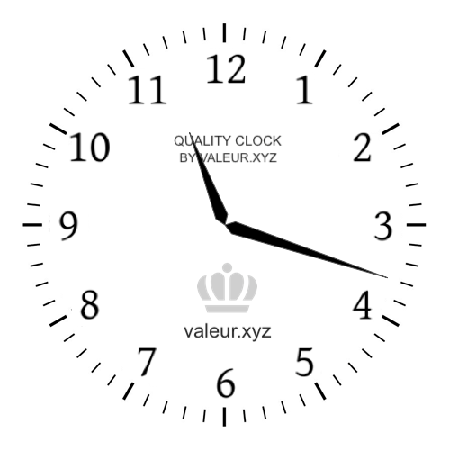 Analog clock showing the time 11:18 AM