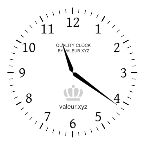 Analog clock showing the time 11:21 PM