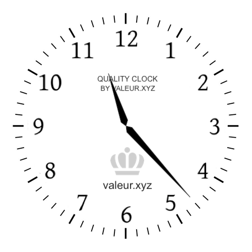 Analog clock showing the time 11:23 AM