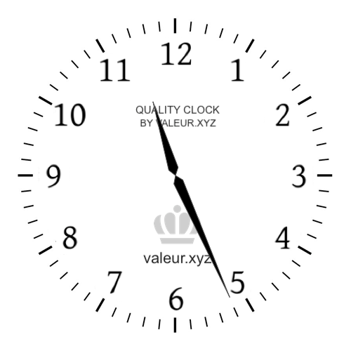 Analog clock showing the time 11:26 AM