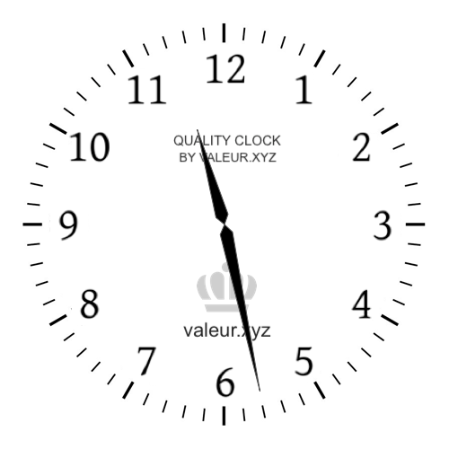 Analog clock showing the time 11:28 PM