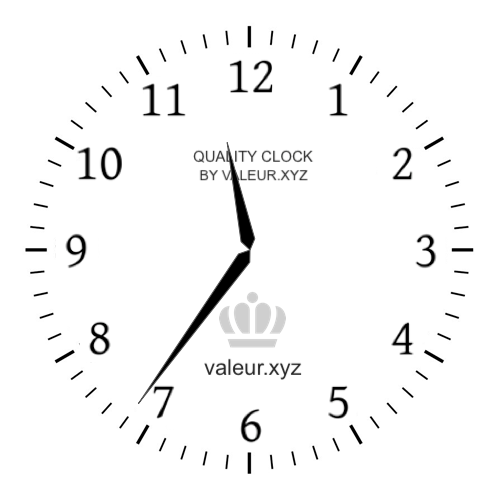 Analog clock showing the time 11:36 AM