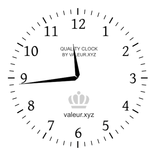 Analog clock showing the time 11:44 PM