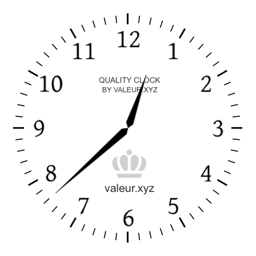Analog clock showing the time 12:38 PM