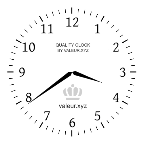 Analog clock showing the time 3:39 PM