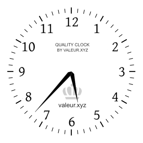Analog clock showing the time 5:37 AM