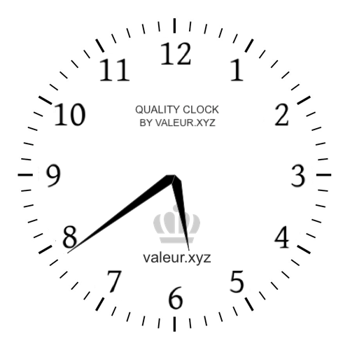 5:39 PM on an analog clock (Five-thirty-nine PM) Analog clock showing the time 5:39 PM
